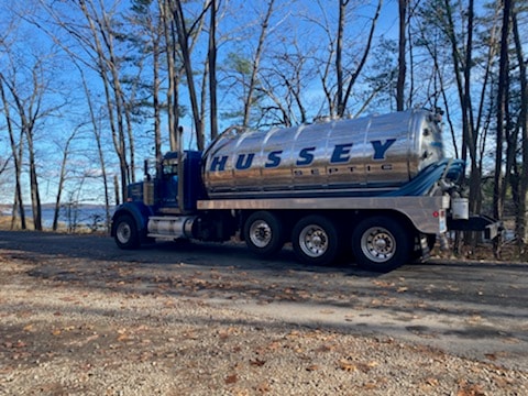 Septic tank pumping truck